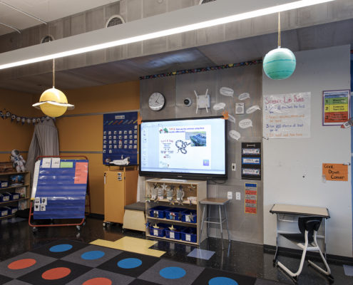 each with a 70” Promethean interactive display, a dedicated Mac Mini, and Elmo Document Camera.